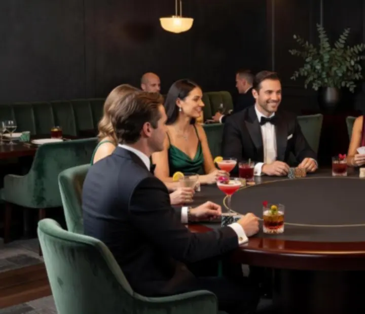 Guests enjoying an atmospheric poker night with cocktails